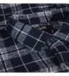 Thumbnail Close-up of collar and top button on checked flannel shirt.