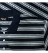 Thumbnail Close-up of navy striped polo chest and collar.