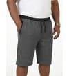 Thumbnail Model wearing charcoal sweat shorts with black waistband and pockets.