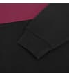 Thumbnail Close-up of black sleeve cuff and colour block seam.